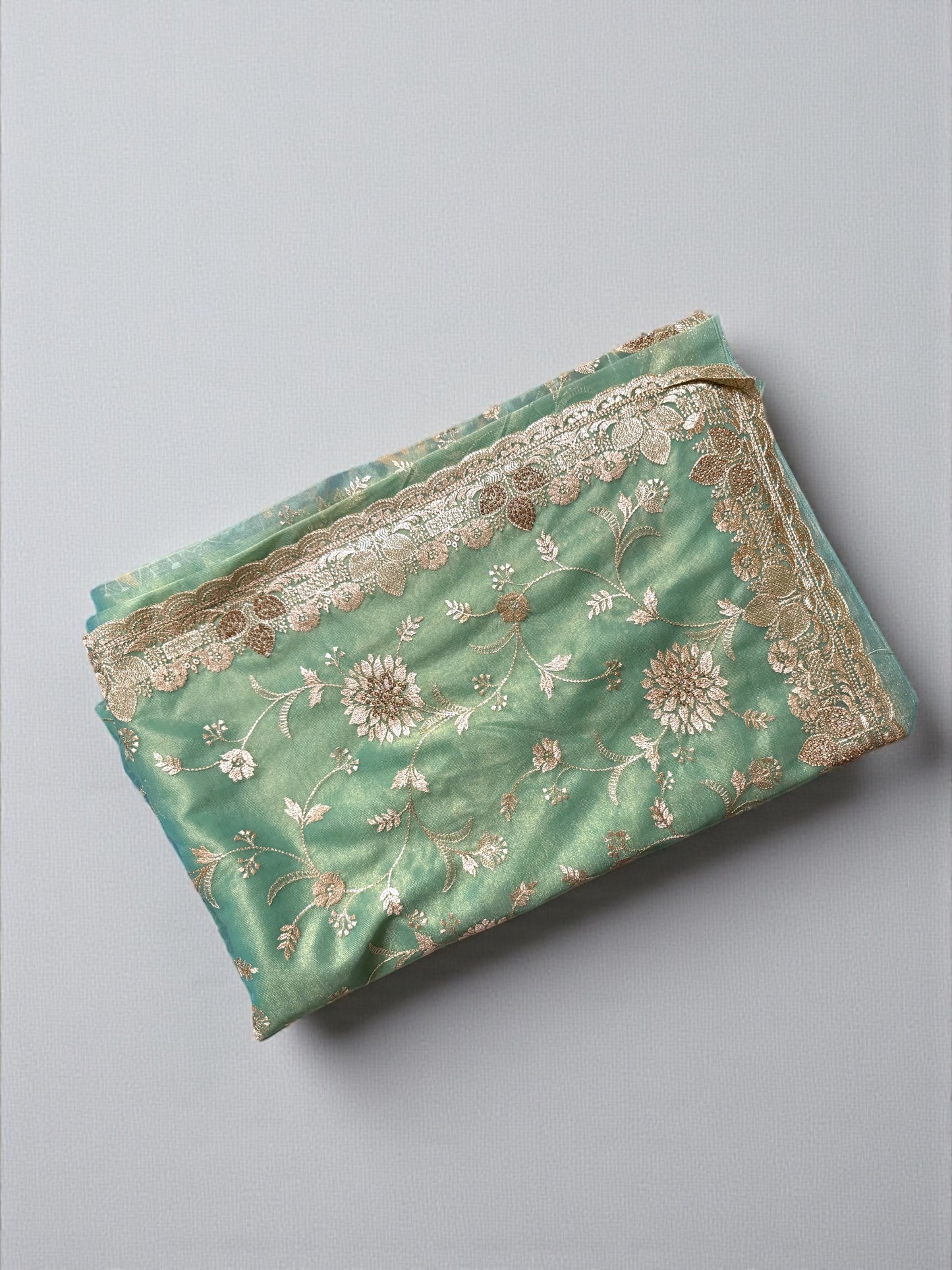 Sea Green Tissue Silk Saree with extensive zari work