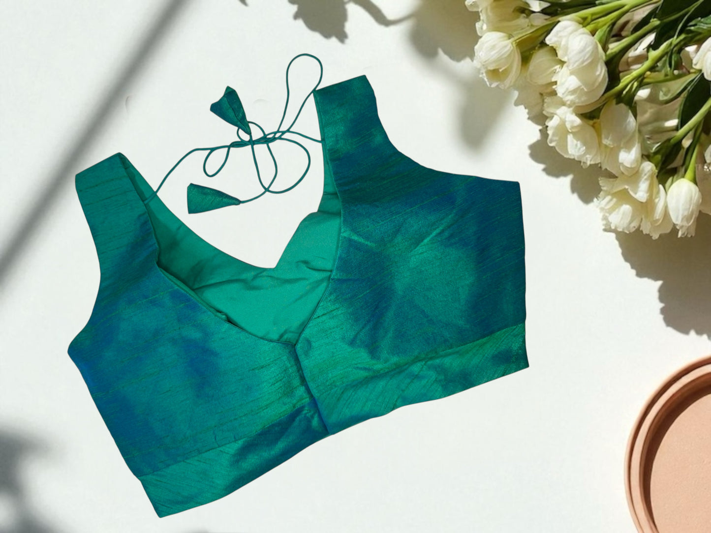 Green sleeveless silk blouse