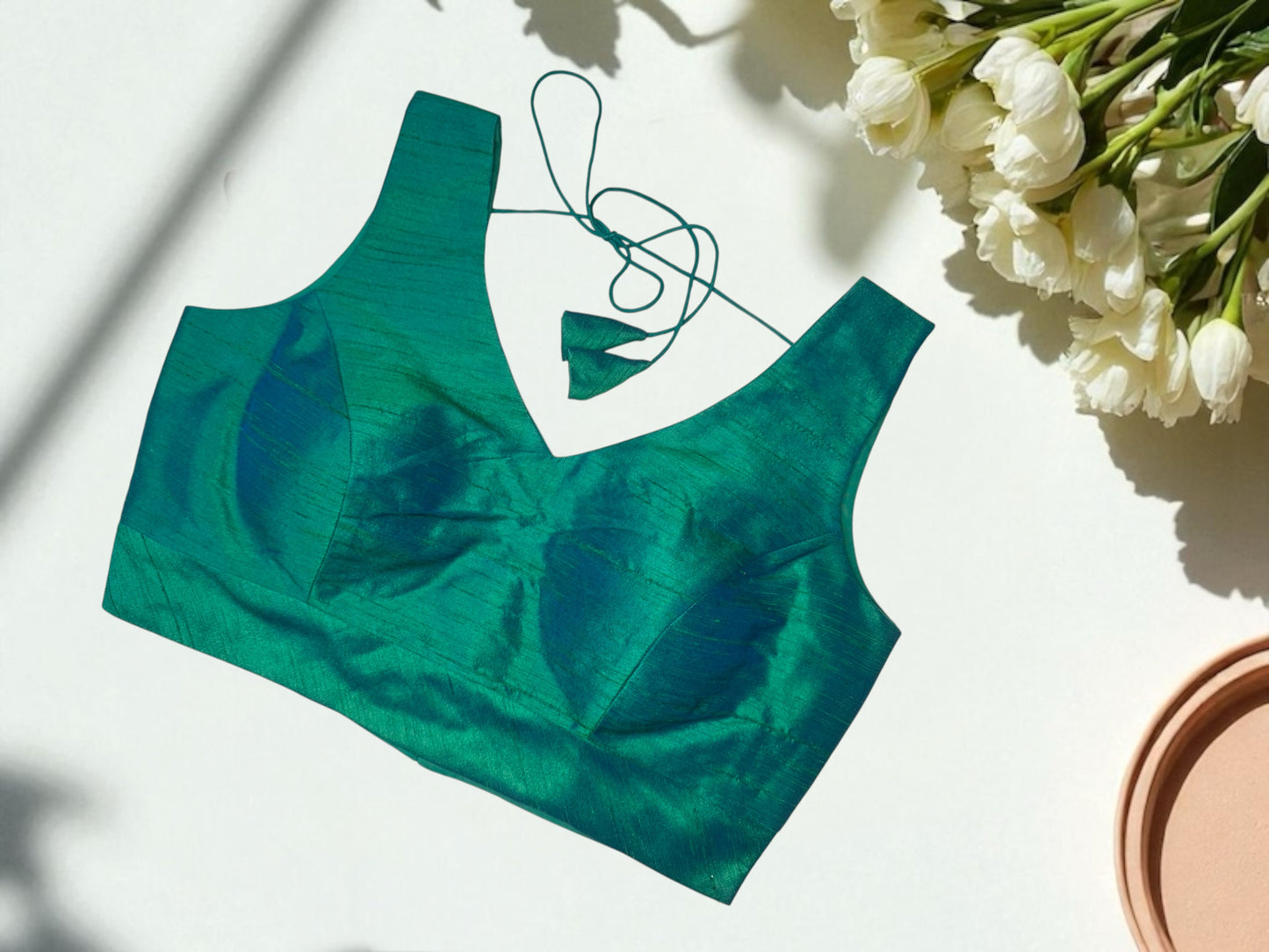 Green sleeveless silk blouse