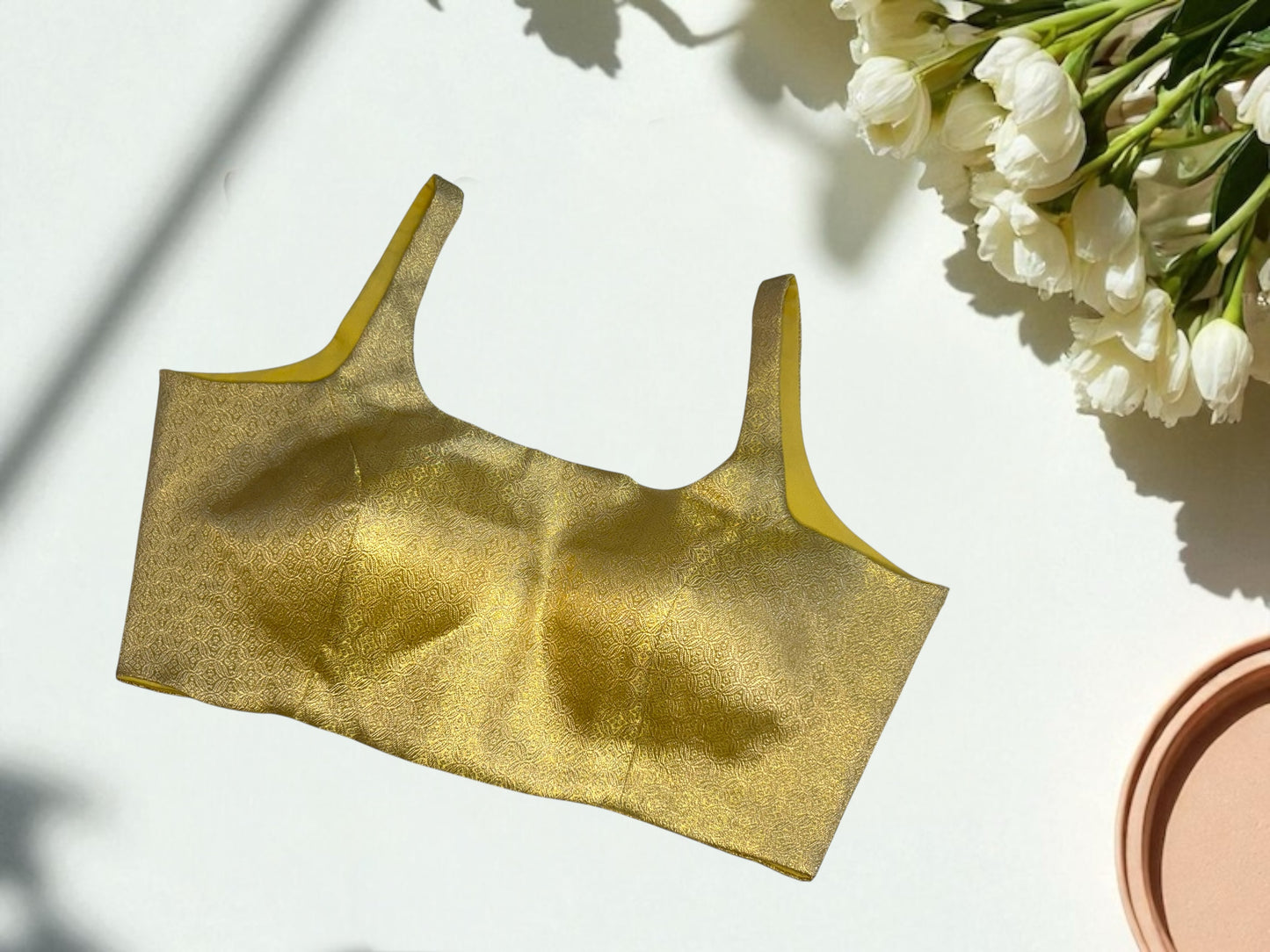 Golden sleeveless silk blouse